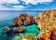 Photo of panoramic beautiful view of Ponta da Piedade with seagulls flying over rocks near Lagos in Algarve, Portugal.