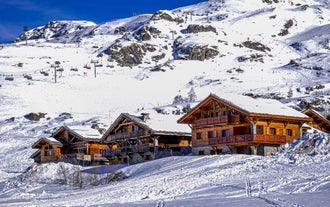 Photo of aerial view of spectacular winter landscape and mountain ski resort in French Alps ,Alpe D Huez, France.
