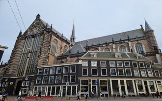 Amsterdam Netherlands dancing houses over river Amstel landmark in old european city spring landscape.