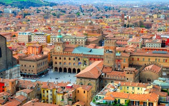 Photo of panorama of Parma cathedral with Baptistery leaning tower on the central square in Parma town in Italy.
