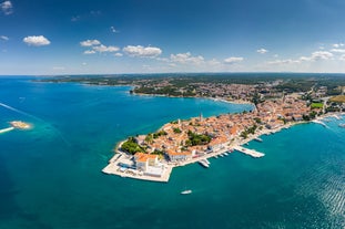 Photo of aerial view of town of Rovinj historic peninsula , famous tourist destination in Istria region of Croatia.