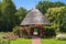 photo of view of Small hut in a rose garden in the Botanical Garden of Szeged Small hut in a rose garden in the Botanical Garden of Szeged, Hungary.