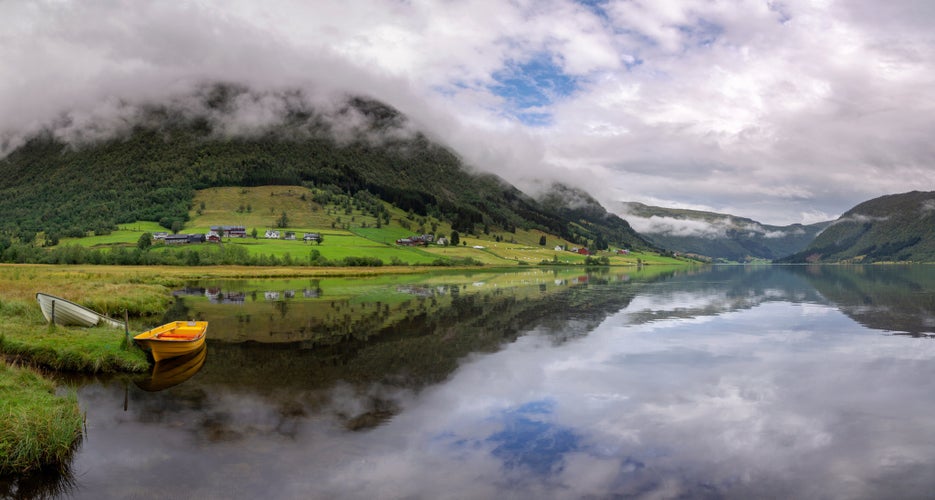 photo of view of Panoramic view over lake Dalavatnet near the Norwegian town Sogndal on a clear and crisp day.