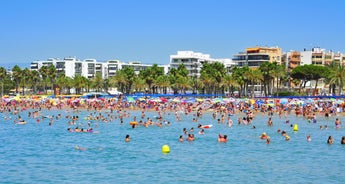 Photo of aerial view of beach and cityscape Salou, Spain.