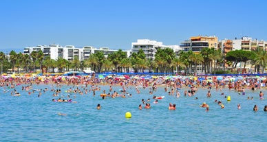 Photo of aerial view of beach and cityscape Salou, Spain.