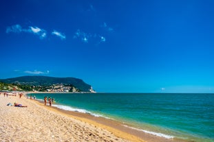 photo of majestic sunrise in Numana public beach. Picturesque summer seascape of Adriatic Sea. Colorful outdoor scene of Italy, Europe.