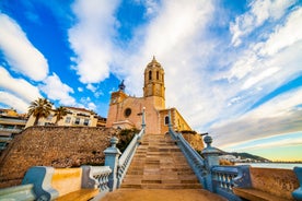 Photo of Sand beach and historical Old Town in mediterranean resort Sitges near Barcelona, Costa Dorada, Catalonia, Spain.