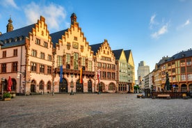 Photo of traditional half-timbered houses on picturesque canals in La Petite France in the medieval fairytale town of Strasbourg, France.