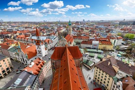 Panoramic view of historic Zurich city center with famous Fraumunster, Grossmunster and St. Peter and river Limmat at Lake Zurich on a sunny day with clouds in summer, Canton of Zurich, Switzerland