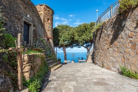 Photo of Riomaggiore with colorful houses along the coastline, one of the five famous coastal village in the Cinque Terre National Park, Liguria, Italy.