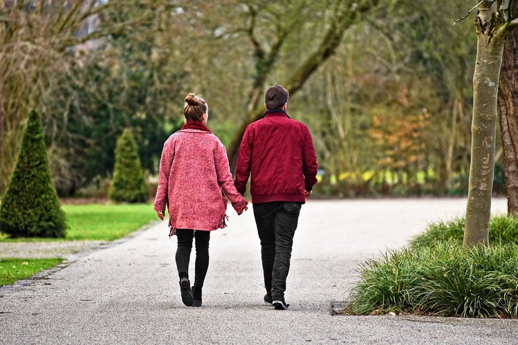 Couple strolling through park in Luxembourg.jpg