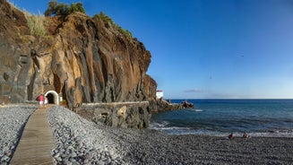 Aerial drone view of Camara de Lobos village, Madeira.