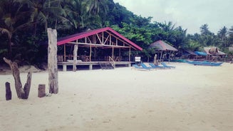 White Beach Front And Cottages