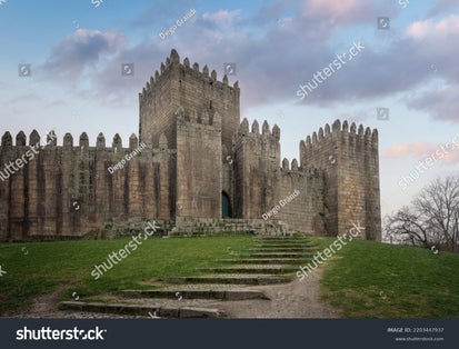 Photo of Castle of GuimarÃ£es at evening ,Guimaraes,Portugal.,
