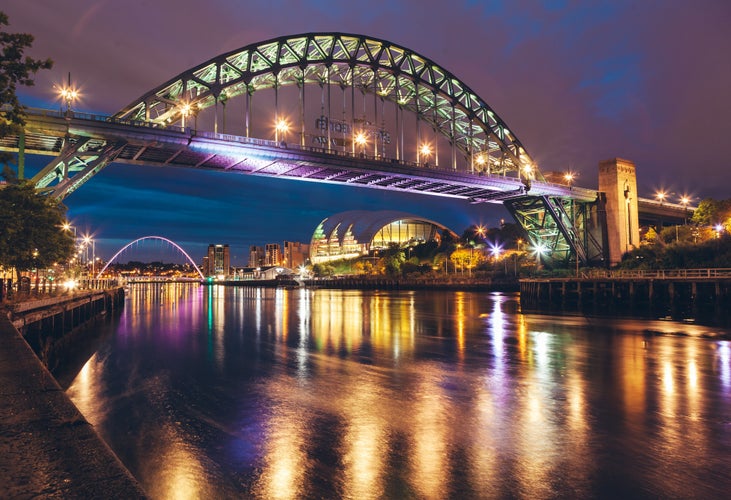 photo of  view  of The Tyne Bridge over the river Tyne in Newcastle, GATESHEAD at night , ENGLAND