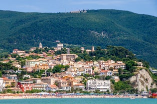 photo of majestic sunrise in Numana public beach. Picturesque summer seascape of Adriatic Sea. Colorful outdoor scene of Italy, Europe.