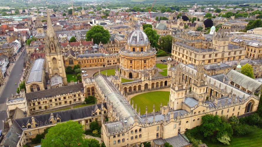 photo of view of Aerial view of the Oxford city, UK. Beautiful medieval city with many castles and traditional English buildings.