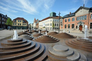 Photo of the harbour of Esbjerg, historical water tower in the background, Jutland, Denmark.