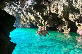 Tour in kayak della grotta della riserva marina inesplorata, snorkeling e salto dalla scogliera