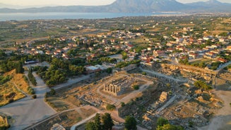 Photo of a small island with a fortress at the coast of Nafplio ,Greece.