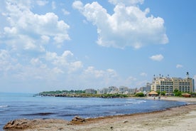 Photo of panoramic aerial view over small ancient resort town of Pomorie with old European small houses , Bulgaria.