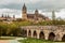 Photo of View on New Cathedral and roman bridge in Salamanca, Spain .