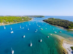 Photo of aerial view of Historic Adriatic town of Krk aerial view, Island of Krk, Kvarner bay of Croatia.