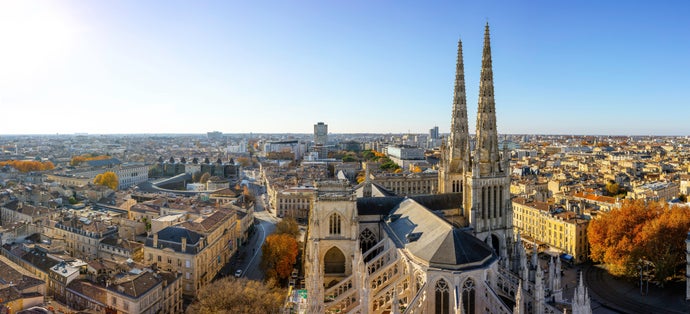 photo of stunning panoramic aerial cityscape from Pey Berland tower of St. Andrew's Cathedral beautiful sunny evening of warm golden autumn, Bordeaux, Gironde, Nouvelle-Aquitaine, France.