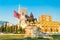 Photo of Skanderbeg square with flag, Skanderbeg monument and The Et'hem Bey Mosque in the center of Tirana city, Albania.