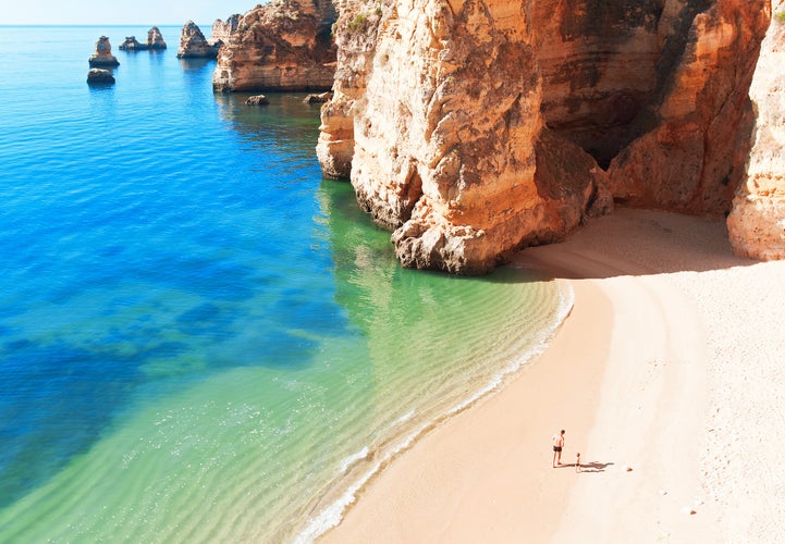 Photo of Coastal cliffs (Ponta da Piedade)with beautiful beach, Lagos, Portugal.