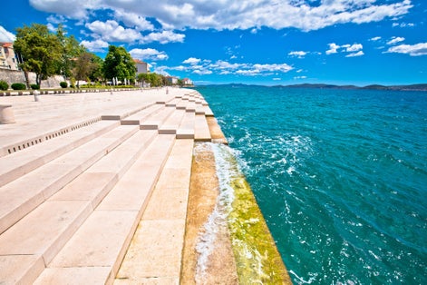 Photo of Zadar sea organs. Tourist attraction musical instrument powered by the underwater sea stream. Dalmatia region of Croatia.