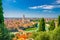 Photo of aerial view of Verona historical city centre, Ponte Pietra bridge across Adige river, Verona Cathedral, Duomo di Verona, red tiled roofs, Veneto Region, Italy.