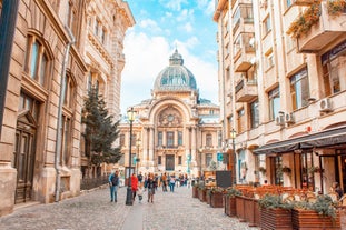 Antique building view in Old Town Bucharest city - capital of Romania and Dambrovita river. Bucharest, Romania, Europe.