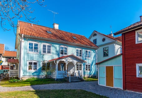 photo of beautiful old timber houses in Wadkoping historical quarter of Orebro, Sweden.