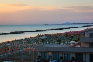 Photo of amazing landscape with beautiful sea beach on sunset in Viserbella, Italy.