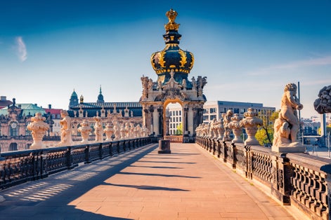 Photo of adorable morning view of popular historical landmark Kronentor (crown gate) in Zwinger palace (Der Dresdner Zwinger) Art Gallery of Dresden.