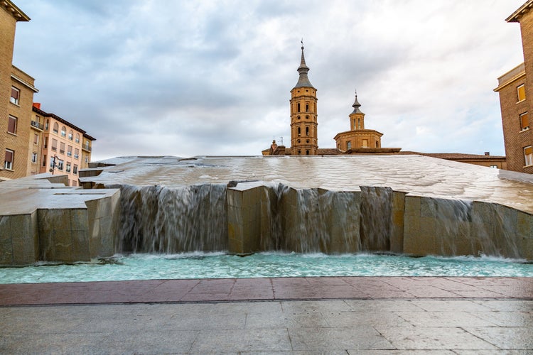 La Fuente del Hispanidad, the Spanish Fountain at Plaza del Pilar and church of San Juan de los Panetes in Zaragoza, Spain..jpg