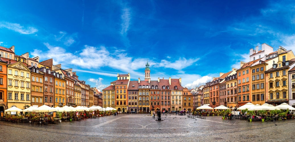 Photo of old town square in Warsaw in a summer day, Poland.