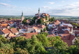 Photo of aerial view on Mikulov town in Czech Republic with Castle and bell tower of Saint Wenceslas Church.