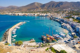 Photo of aerial view of Malia beach and small island with Church of Transfiguration, Heraklion, Crete, Greece.