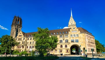 Photo of beautiful panoramic view of historic Bremen Market Square in the center of the Hanseatic City of Bremen with The Schuetting and famous Raths buildings on a sunny day with blue sky in summer, Germany.