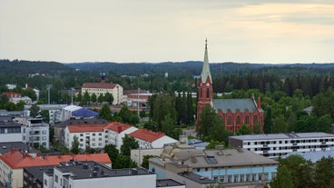 Photo of aerial view of beautiful landscape of lakes and forest in Imatra, Finland.