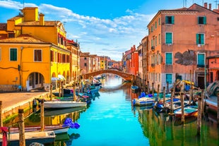 Photo of Aerial view of the white tall apartment buildings of the coast of Chioggia in Italy.