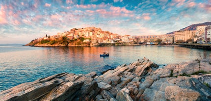 Photo of a small island with a fortress at the coast of Nafplio ,Greece.