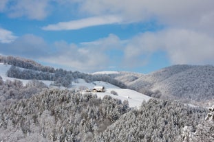 Photo of  beautiful Scuol town in Swiss Alps and Inn river, Switzerland.