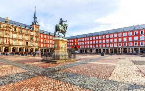 Photo of Plaza Mayor with statue of King Philips III in Madrid, Spain.
