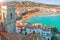 Photo of View of the sea from a height of Pope Luna's Castle. Valencian Community, Spain. Peniscola. Castell. The medieval castle of the Knights Templar on the beach. Beautiful view of the sea and the bay.