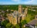 Photo of aerial view of Durham Cathedral that is a cathedral in the historic city center of Durham, England, UK.