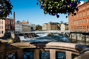 Photo of Motala stream in Norrkoping during fall, that is a historic industrial town in Sweden.