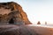 photo of  Hálsanefshellir Cave, a beautiful cave on a black sand beach during sunrise in Iceland.